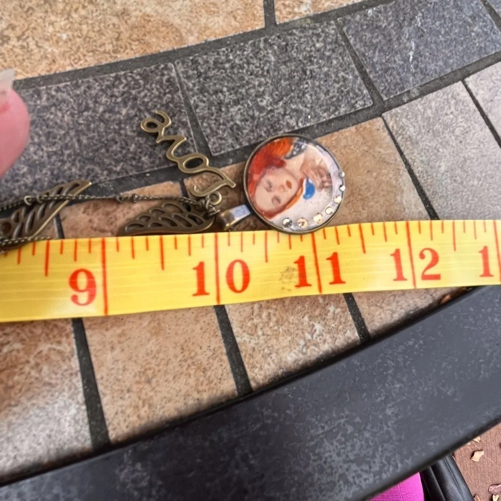 Handmade necklace with portrait and charms